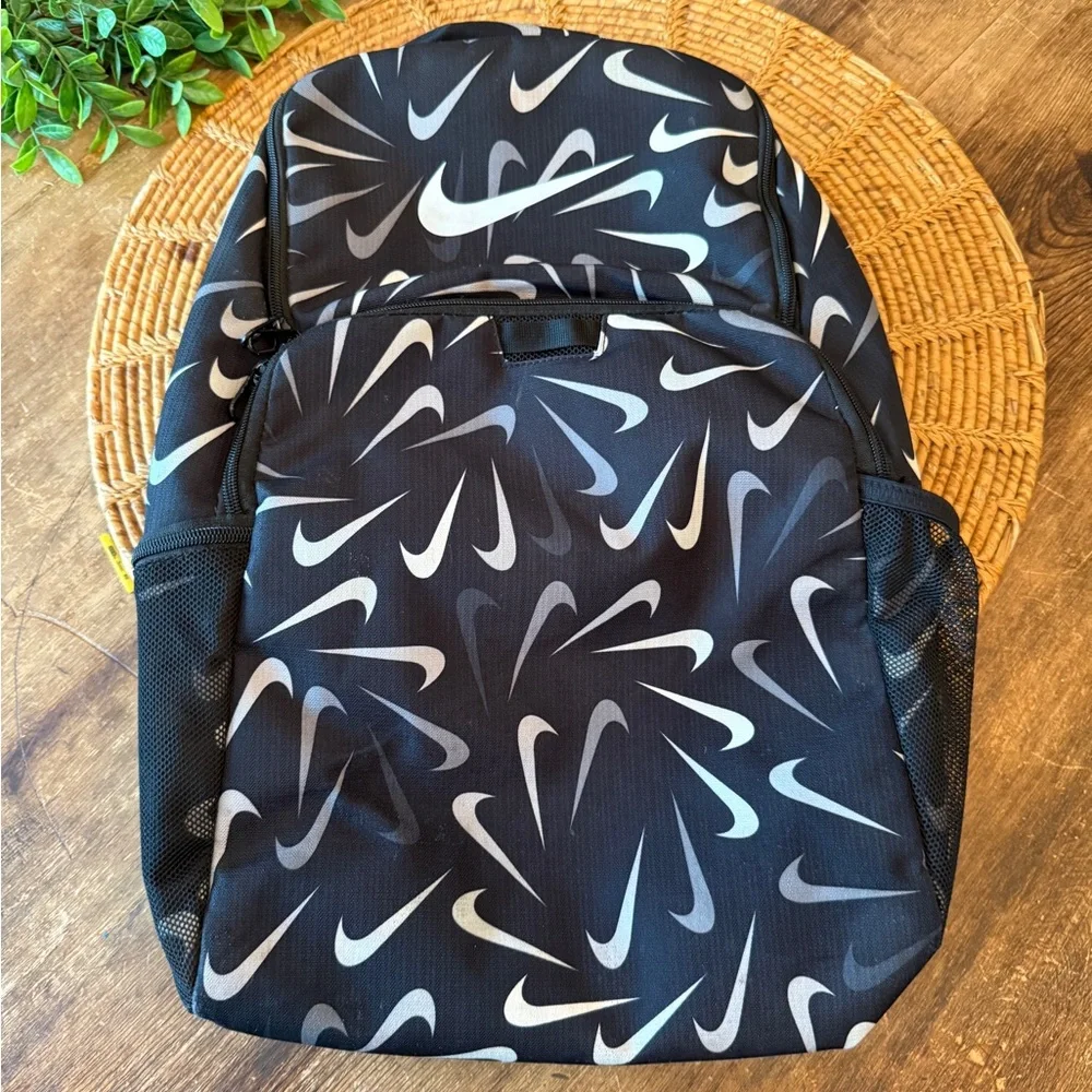 Nike Black and Gray Swoosh Logo Pattern Backpack